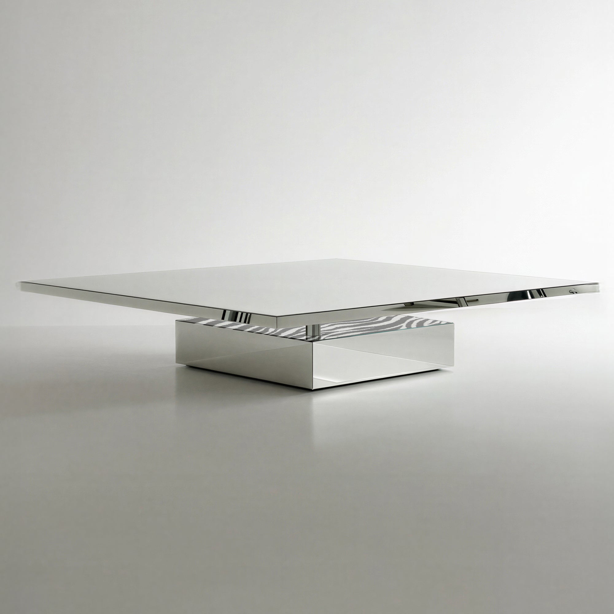 Studio view of the mirrored 330 Glass Table